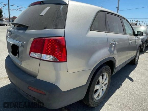 2012 Kia Sorento LX with VIN 5XYKT3A10CG304310, listed as a Copart auction lot 51162655 with 170,281 mi miles and Clean Title. Bid and sale history available at DreamBid. Image 4.