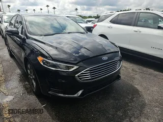 2020 Ford Fusion SEL with VIN 3FA6P0CD1LR122669, listed as a IAAI auction lot 42295663 with 89,389 mi miles and . Bid and sale history available at DreamBid. Image 1.