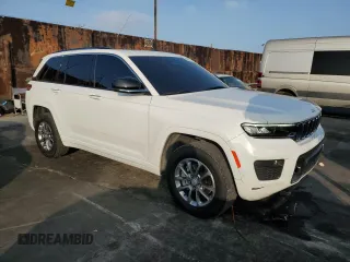 2023 Jeep Grand Cherokee Overland with VIN 1C4RJHDG8PC502208, listed as a Copart auction lot 86927734 with 53,732 mi miles and Salvage title. Bid and sale history available at DreamBid. Image 4.