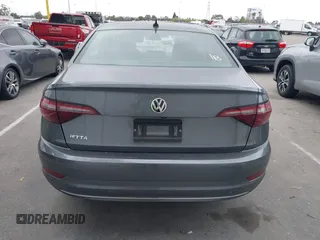 2020 Volkswagen Jetta S z VIN 3VWCB7BUXLM069700, wystawiony jako IAAI lot #42373109 z przebiegiem 66 141 mil mil oraz . Historia ofert i sprzedaży dostępna na DreamBid. Obrazek 16.
