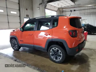 2015 Jeep Renegade Trailhawk with VIN ZACCJBCTXFPB80067, listed as a Copart auction lot 64927985 with Not provided miles and Salvage title. Bid and sale history available at DreamBid. Image 2.