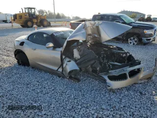 2009 BMW Z4 sDrive30i with VIN WBALM53509E161273, listed as a Copart auction lot 80563954 with 0 mi miles and Salvage Title. Bid and sale history available at carsss.com. Image 4.