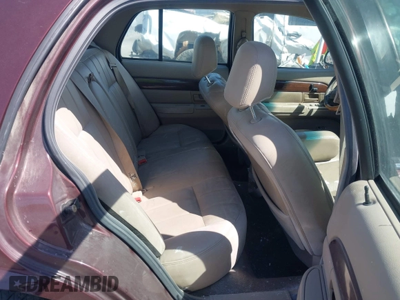 2003 Mercury Grand Marquis LS Premium z VIN 2MEFM75W73X650193, wystawiony jako IAAI lot #41803310 z przebiegiem 151 719 mil mil oraz . Historia ofert i sprzedaży dostępna na DreamBid. Obrazek 8.
