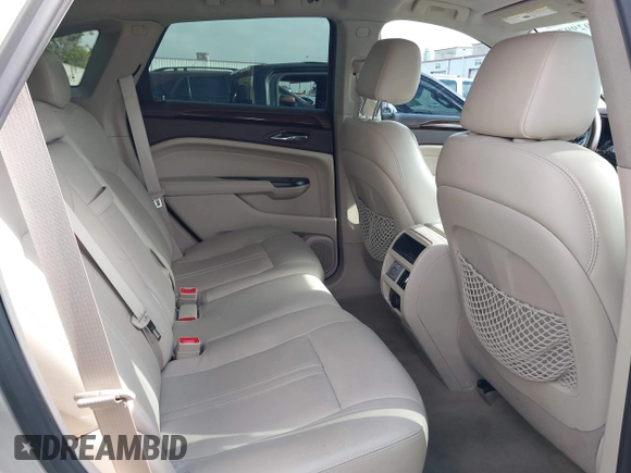 2015 Cadillac SRX Luxury Collection with VIN 3GYFNEE33FS548324, listed as a IAAI auction lot 42029979 with 70,372 mi miles. Bid and sale history available at carsss.com. Image 8.