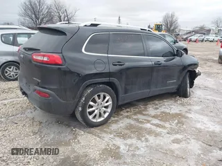 2016 Jeep Cherokee Limited with VIN 1C4PJMDS4GW144205, listed as a IAAI auction lot 41500452 with 129,480 mi miles and . Bid and sale history available at DreamBid. Image 4.