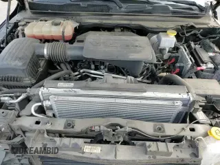 2020 Ram 1500 Big Horn z VIN 1C6RREFG1LN333692, wystawiony jako Copart lot #84649694 z przebiegiem 67 046 mil mil oraz Szkoda całkowita • Salvage title. Historia ofert i sprzedaży dostępna na DreamBid. Obrazek 14.