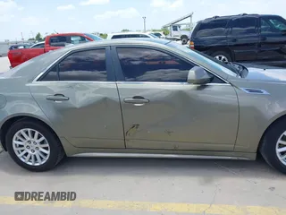 2010 Cadillac CTS Luxury with VIN 1G6DG5EG6A0148433, listed as a IAAI auction lot 42686517 with 106,701 mi miles and . Bid and sale history available at DreamBid. Image 13.