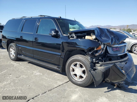 2005 GMC Yukon XL Denali with VIN 1GKFK66U15J136709, listed as a Copart auction lot 70467974 with 112,407 mi miles and Salvage Title. Bid and sale history available at carsss.com. Image 4.