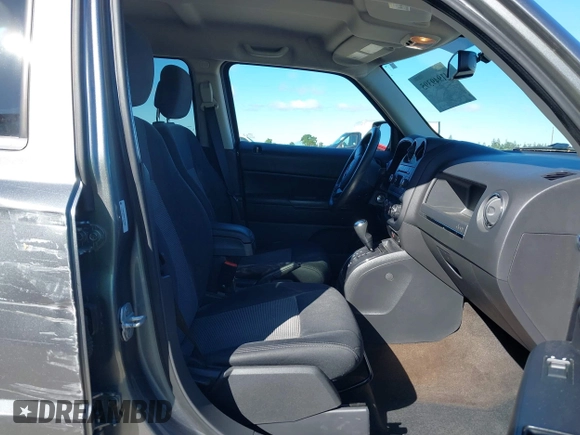 2014 Jeep Patriot Sport with VIN 1C4NJRBB5ED574390, listed as a IAAI auction lot 41949395 with 61,911 mi miles. Bid and sale history available at carsss.com. Image 5.