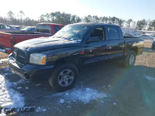 2006 Dodge Dakota SLT with VIN 1D7HW48N96S671842, listed as a IAAI auction lot 41286872 with 192,914 mi miles. Bid and sale history available at carsss.com. Image 2.