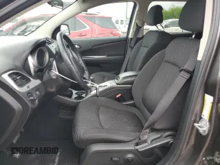2017 Dodge Journey SXT z VIN 3C4PDCBG3HT516401, wystawiony jako Copart lot #56498445 z przebiegiem 65 156 mil mil oraz Szkoda całkowita • Salvage title. Historia ofert i sprzedaży dostępna na DreamBid. Obrazek 7.