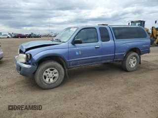 1999 Toyota Tacoma z VIN 4TAWN72N8XZ557057, wystawiony jako Copart lot #57555315 z przebiegiem 238 472 mil mil oraz Szkoda całkowita • Salvage title. Historia ofert i sprzedaży dostępna na DreamBid. Obrazek 1.