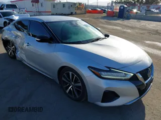 2021 Nissan Maxima SV with VIN 1N4AA6CV7MC512294, listed as a IAAI auction lot 42243607 with 87,803 mi miles and . Bid and sale history available at DreamBid. Image 1.