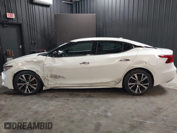 2018 Nissan Maxima SV with VIN 1N4AA6AP7JC406251, listed as a IAAI auction lot 41786523 with 117,403 mi miles and . Bid and sale history available at DreamBid. Image 6.