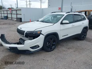 2019 Jeep Cherokee Latitude Plus with VIN 1C4PJLLBXKD405322, listed as a IAAI auction lot 41708104 with 93,295 mi miles and . Bid and sale history available at DreamBid. Image 20.