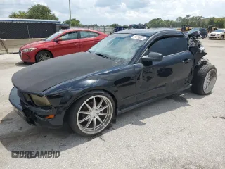 2006 Ford Mustang Standard with VIN 1ZVHT80N565208825, listed as a Copart auction lot 64799405 with 150,857 mi miles and Salvage title. Bid and sale history available at DreamBid. Image 1.