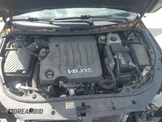 2012 Buick LaCrosse Touring with VIN 1G4GJ5E35CF323193, listed as a Copart auction lot 53535615 with 104,129 mi miles and Salvage title. Bid and sale history available at DreamBid. Image 11.