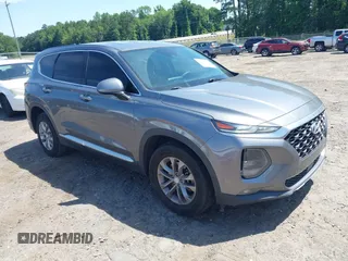 2019 Hyundai Santa Fe SEL z VIN 5NMS33AD5KH048440, wystawiony jako IAAI lot #41995318 z przebiegiem 77 982 mil mil oraz . Historia ofert i sprzedaży dostępna na DreamBid. Obrazek 1.