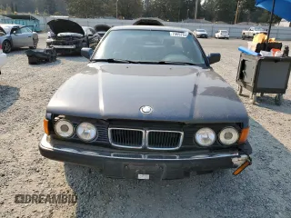 1994 BMW 7 Series z VIN WBAGD4329RDE68127, wystawiony jako Copart lot #70697044 z przebiegiem 179 943 mil mil oraz Czysty tytuł • Clean title. Historia ofert i sprzedaży dostępna na DreamBid. Obrazek 5.
