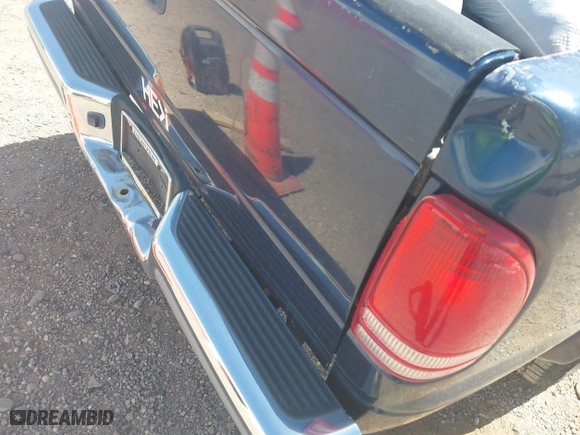 2002 Dodge Dakota SLT with VIN 1B7HL48N32S708719, listed as a IAAI auction lot 42027763 with 217,797 mi miles. Bid and sale history available at carsss.com. Image 6.