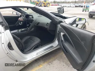 2015 Chevrolet Corvette Z51 3LT z VIN 1G1YM2D74F5114985, wystawiony jako IAAI lot #42077336 z przebiegiem 52 965 mil mil oraz . Historia ofert i sprzedaży dostępna na DreamBid. Obrazek 5.