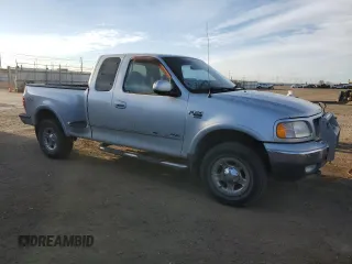 1999 Ford F-150 XL с VIN 1FTRX08L3XKA96271, выставлен на аукционе Copart как лот 49238415 с пробегом 168 477 миль миль и Списание • Salvage title. История ставок и продаж доступна на DreamBid. Изображение 4.