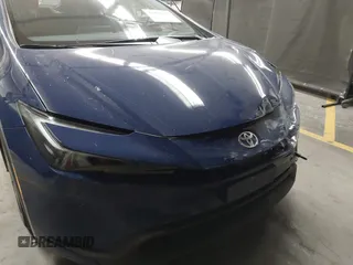 2024 Toyota Prius LE with VIN JTDACAAU0R3030582, listed as a IAAI auction lot 41838615 with 9,402 mi miles and . Bid and sale history available at DreamBid. Image 6.