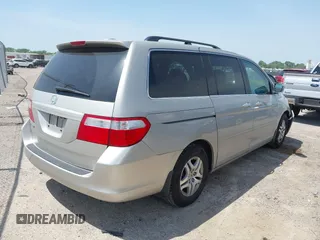 2007 Honda Odyssey EX-L with VIN 5FNRL38757B431334, listed as a IAAI auction lot 42026018 with 135,898 mi miles. Bid and sale history available at carsss.com. Image 4.