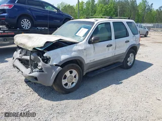 2001 Ford Escape XLT with VIN 1FMYU03171KA35485, listed as a IAAI auction lot 42052581 with 242,653 mi miles. Bid and sale history available at carsss.com. Image 2.