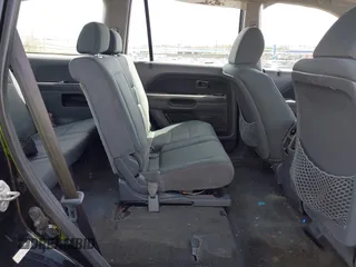 2007 Honda Pilot LX with VIN 5FNYF28117B044692, listed as a IAAI auction lot 42081205 with 173,744 mi miles and . Bid and sale history available at DreamBid. Image 8.