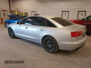 2014 Audi A6 Premium Plus with VIN WAUFGAFC7EN146819, listed as a IAAI auction lot 42072873 with 151,036 mi miles and . Bid and sale history available at DreamBid. Image 3.