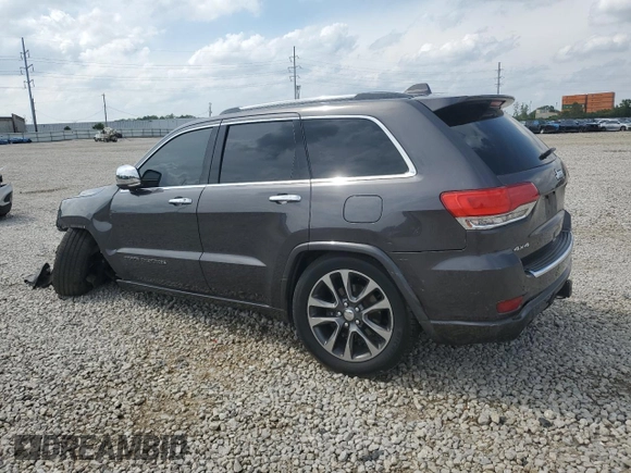 2017 Jeep Grand Cherokee Overland z VIN 1C4RJFCG1HC684826, wystawiony jako Copart lot #59971595 z przebiegiem 101 765 mil mil oraz Szkoda całkowita • Salvage title. Historia ofert i sprzedaży dostępna na DreamBid. Obrazek 2.