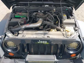 2008 Jeep Wrangler X with VIN 1J4FA24138L521983, listed as a IAAI auction lot 42263960 with 113,971 mi miles and . Bid and sale history available at DreamBid. Image 10.