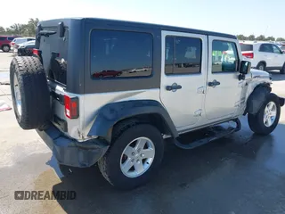 2010 Jeep Wrangler Unlimited Sport with VIN 1J4BA3H17AL211887, listed as a IAAI auction lot 41778324 with 185,626 mi miles. Bid and sale history available at carsss.com. Image 4.