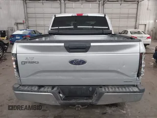 2015 Ford F-150 XLT with VIN 1FTEW1E89FFA44710, listed as a IAAI auction lot 41521584 with 158,297 mi miles. Bid and sale history available at carsss.com. Image 17.