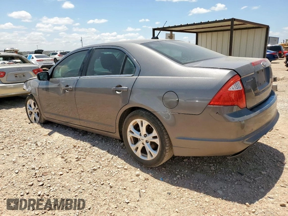2012 Ford Fusion SE with VIN 3FAHP0HA9CR435931, listed as a Copart auction lot 61633525 with 169,561 mi miles and Salvage title. Bid and sale history available at DreamBid. Image 2.