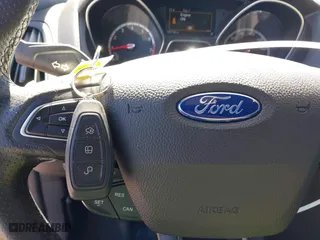 2015 Ford Focus ST with VIN 1FADP3L98FL292289, listed as a IAAI auction lot 41670338 with 100,742 mi miles. Bid and sale history available at carsss.com. Image 11.