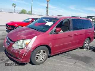 2005 Honda Odyssey EX z VIN 5FNRL38445B401163, wystawiony jako IAAI lot #42294253 z przebiegiem 152 576 mil mil oraz . Historia ofert i sprzedaży dostępna na DreamBid. Obrazek 13.