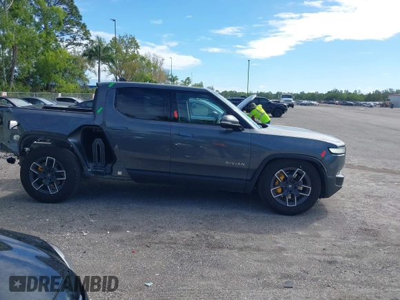 2022 Rivian R1T Launch Edition with VIN 7FCTGAAL9NN004060, listed as a IAAI auction lot 41637884 with 40,268 mi miles. Bid and sale history available at carsss.com. Image 14.