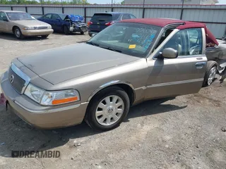 2004 Mercury Grand Marquis LS Premium z VIN 2MEFM75W34X674542, wystawiony jako IAAI lot #42018186 z przebiegiem 137 944 mil mil oraz . Historia ofert i sprzedaży dostępna na DreamBid. Obrazek 18.