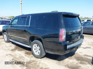 2016 GMC Yukon XL Denali with VIN 1GKS2HKJ2GR111246, listed as a IAAI auction lot 41834364 with 73,418 mi miles. Bid and sale history available at carsss.com. Image 3.