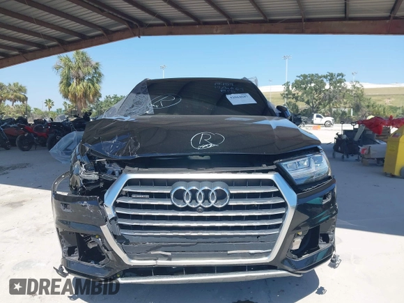 2017 Audi Q7 Premium Plus with VIN WA1LHAF75HD040203, listed as a IAAI auction lot 42064687 with 100,845 mi miles and . Bid and sale history available at DreamBid. Image 12.
