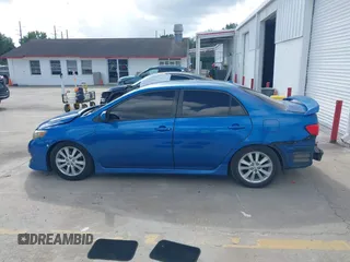2009 Toyota Corolla with VIN 2T1BU40E69C154781, listed as a IAAI auction lot 42009936 with 180,039 mi miles. Bid and sale history available at carsss.com. Image 14.