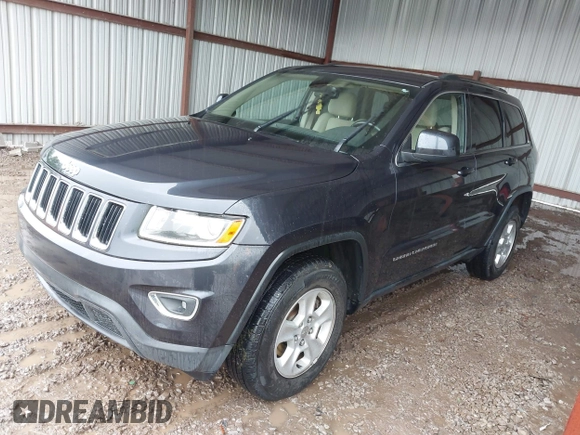 2014 Jeep Grand Cherokee Laredo with VIN 1C4RJEAG6EC206748, listed as a IAAI auction lot 42244421 with 198,217 mi miles and . Bid and sale history available at DreamBid. Image 17.