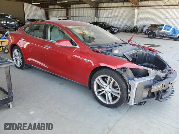 2013 Tesla Model S with VIN 5YJSA1AG5DFP12177, listed as a Copart auction lot 61846195 with 130,668 mi miles and Salvage title. Bid and sale history available at DreamBid. Image 4.