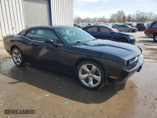 2012 Dodge Challenger SXT with VIN 2C3CDYAG6CH210053, listed as a Copart auction lot 46537135 with 64,282 mi miles and Salvage Title. Bid and sale history available at carsss.com. Image 4.