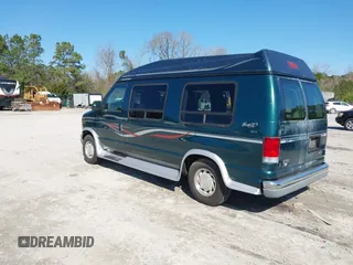 1999 Ford Econoline Cargo with VIN 1FDRE14W2XHB18989, listed as a IAAI auction lot 41740961 with 152,028 mi miles. Bid and sale history available at carsss.com. Image 3.