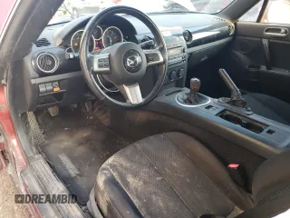 2007 Mazda MX-5 Miata Sport z VIN JM1NC25F970124896, wystawiony jako Copart lot #83624394 z przebiegiem 62 735 mil mil oraz Szkoda całkowita • Salvage title. Historia ofert i sprzedaży dostępna na DreamBid. Obrazek 8.