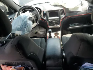 2019 Jeep Grand Cherokee Laredo E z VIN 1C4RJFAG4KC636067, wystawiony jako Copart lot #59232885 z przebiegiem Nie podano mil oraz Szkoda całkowita • Salvage title. Historia ofert i sprzedaży dostępna na DreamBid. Obrazek 8.
