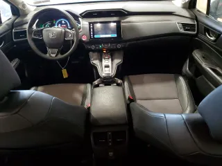 2018 Honda Clarity z VIN JHMZC5F16JC013751, wystawiony jako Copart lot #56651145 z przebiegiem 61 385 mil mil oraz Szkoda całkowita • Salvage title. Historia ofert i sprzedaży dostępna na DreamBid. Obrazek 8.